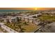 Aerial view of condo building and waterfront property at 3810 Gulf Of Mexico Dr # F302, Longboat Key, FL 34228