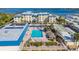 Aerial view of a community pool and recreational area at 3810 Gulf Of Mexico Dr # F302, Longboat Key, FL 34228