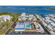Aerial view showing the community pool and waterfront location at 3810 Gulf Of Mexico Dr # F302, Longboat Key, FL 34228