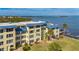 Aerial view of the building showcasing its waterfront location at 3810 Gulf Of Mexico Dr # F302, Longboat Key, FL 34228