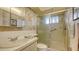 Clean bathroom with shower stall and vanity at 3810 Gulf Of Mexico Dr # F302, Longboat Key, FL 34228