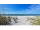 Sandy beach access path to the ocean at 3810 Gulf Of Mexico Dr # F302, Longboat Key, FL 34228