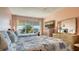 Bedroom features water views and ample closet space at 3810 Gulf Of Mexico Dr # F302, Longboat Key, FL 34228