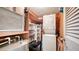 Convenient laundry closet with stackable washer/dryer at 3810 Gulf Of Mexico Dr # F302, Longboat Key, FL 34228