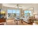Living room boasts water views and ample natural light at 3810 Gulf Of Mexico Dr # F302, Longboat Key, FL 34228