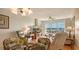 Bright living room with water views and comfortable seating at 3810 Gulf Of Mexico Dr # F302, Longboat Key, FL 34228