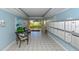 Building lobby with comfortable seating and mailboxes at 3810 Gulf Of Mexico Dr # F302, Longboat Key, FL 34228