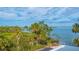 Breathtaking water view with lush tropical landscape at 3810 Gulf Of Mexico Dr # F302, Longboat Key, FL 34228
