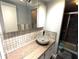 Updated bathroom with vessel sink and walk-in shower at 425 30Th W Ave # C212, Bradenton, FL 34205