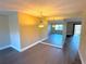 Elegant dining area with dark hardwood floors and a chandelier at 425 30Th W Ave # C212, Bradenton, FL 34205