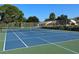 Well-maintained tennis court with blue surface at 425 30Th W Ave # C212, Bradenton, FL 34205