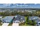 Aerial view showcasing a house's exterior, landscaping, and neighborhood at 4304 Fly Rod Ter, Parrish, FL 34219