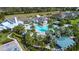 Community pool and clubhouse, with landscaping and homes visible at 4304 Fly Rod Ter, Parrish, FL 34219