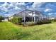 Home with fenced pool and lush landscaping at 4304 Fly Rod Ter, Parrish, FL 34219