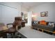 Home office with a desk, chair, and comfortable couch at 4304 Fly Rod Ter, Parrish, FL 34219