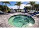 Relaxing community hot tub with lounge chairs nearby at 4304 Fly Rod Ter, Parrish, FL 34219