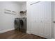 Laundry room with washer, dryer, and extra storage space at 4304 Fly Rod Ter, Parrish, FL 34219