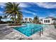 L-shaped community pool with a view of the clubhouse at 4304 Fly Rod Ter, Parrish, FL 34219