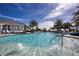 Refreshing pool with bubbling jets and palm trees at 4304 Fly Rod Ter, Parrish, FL 34219