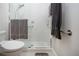 Clean shower with bright white tiles and glass enclosure at 4304 Fly Rod Ter, Parrish, FL 34219