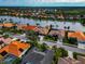 Aerial view of a luxury home and its surrounding neighborhood at 4917 Sabal Lake Cir, Sarasota, FL 34238