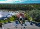 Community center with tile roof near a lake, ample parking at 4917 Sabal Lake Cir, Sarasota, FL 34238