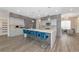 Modern kitchen with stainless steel appliances and a large island at 4917 Sabal Lake Cir, Sarasota, FL 34238
