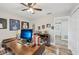 Home office with a large desk, hardwood floors, and access to hallway at 5405 Champagne # 59, Sarasota, FL 34235