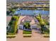 Luxury waterfront home with private dock and two-car garage; beautiful landscaping at 5607 Tidewater Preserve Blvd, Bradenton, FL 34208