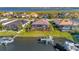 Canal front home boasting a private dock and lush landscaping at 5607 Tidewater Preserve Blvd, Bradenton, FL 34208