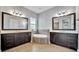 Double vanity bathroom with soaking tub and separate shower at 5607 Tidewater Preserve Blvd, Bradenton, FL 34208