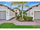 House exterior with walkway and lush landscaping at 5607 Tidewater Preserve Blvd, Bradenton, FL 34208