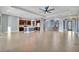 Open concept Gathering room with kitchen and dining area at 5607 Tidewater Preserve Blvd, Bradenton, FL 34208