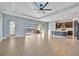 Open concept Gathering room with kitchen and access to lanai at 5607 Tidewater Preserve Blvd, Bradenton, FL 34208