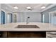 Modern kitchen island with a built in sink at 5607 Tidewater Preserve Blvd, Bradenton, FL 34208
