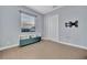 Bright home office with a teal media cabinet and window at 5607 Tidewater Preserve Blvd, Bradenton, FL 34208