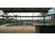 Enclosed pool and spa with water feature; fire pit and seating area at 5607 Tidewater Preserve Blvd, Bradenton, FL 34208