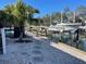 Private boat dock with lift and access to the water at 579 Commonwealth Ln, Sarasota, FL 34242