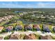 Community overview with lake and homes at 6625 Dovekey Dr, Sarasota, FL 34241