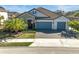 Stunning curb appeal with a three-car garage at 6625 Dovekey Dr, Sarasota, FL 34241