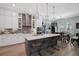 Spacious kitchen boasting a large island, stainless steel appliances, and ample counter space at 6625 Dovekey Dr, Sarasota, FL 34241