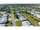 Aerial showing community layout, homes, and green spaces at 6704 11Th W Ave, Bradenton, FL 34209