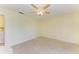 Spacious bedroom with ceiling fan and tile flooring at 6704 11Th W Ave, Bradenton, FL 34209