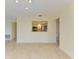 Kitchen with pass-through to dining area, featuring modern appliances at 6704 11Th W Ave, Bradenton, FL 34209