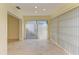 Sunroom with tile floors and access to the outdoors at 6704 11Th W Ave, Bradenton, FL 34209