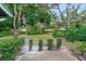 Landscaped backyard with lush greenery at 7340 Silver Fern Blvd # 5, Sarasota, FL 34241