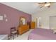 Main bedroom with walk-in closet and dresser at 7340 Silver Fern Blvd # 5, Sarasota, FL 34241