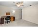 Bright bedroom with ceiling fan, built-in desk and plenty of space at 7340 Silver Fern Blvd # 5, Sarasota, FL 34241