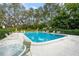 Inviting community pool with lounge chairs at 7340 Silver Fern Blvd # 5, Sarasota, FL 34241