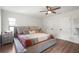 Comfortable main bedroom featuring a king-size bed and ensuite access at 7507 3Rd Nw Ave, Bradenton, FL 34209